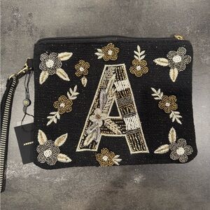 America and Beyond Black and Gold Floral‎ Beaded Clutch